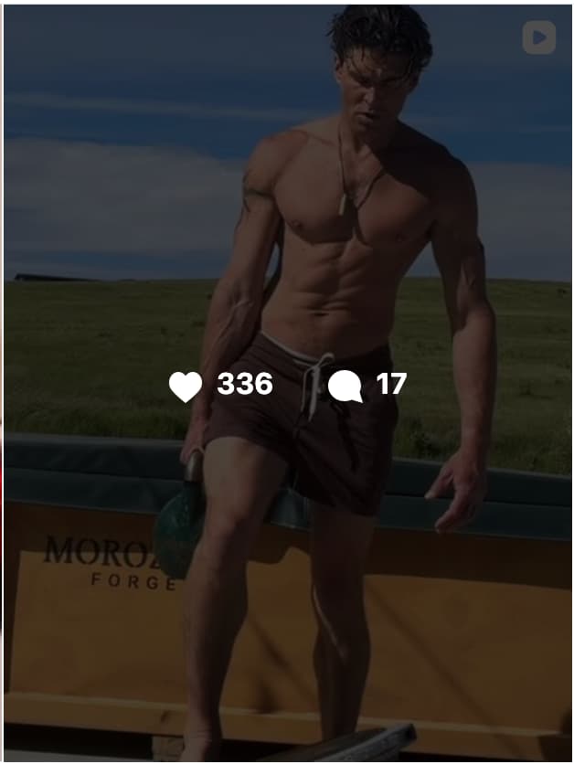 Video thumbnail of Ben Greenfield shirtless outdoors, wearing dark shorts and a chain necklace, with a grassy landscape in the background and partial text reading 'Mora Force' visible at the bottom. The post shows 336 likes and 17 comments.